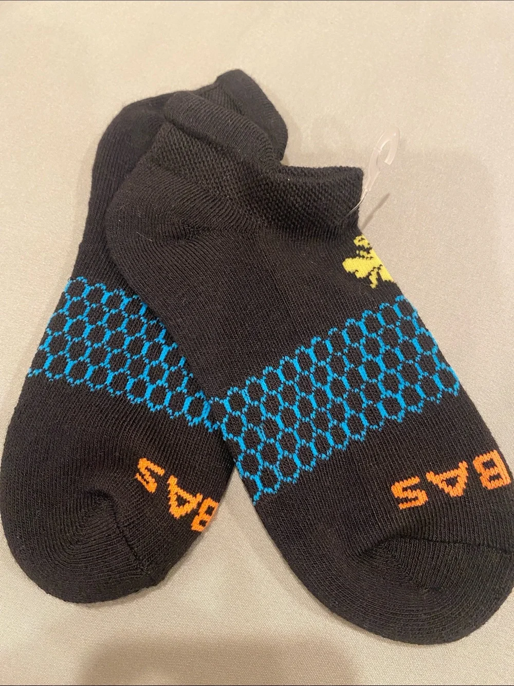 Bombas Black Low-Cut Socks with Blue and Orange Accents